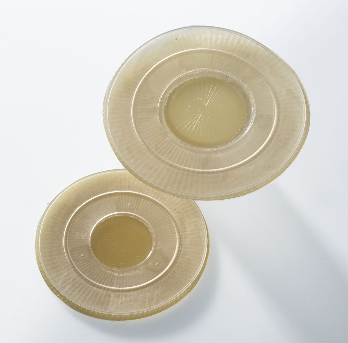 Pediatric Ostomy Barrier Assura® AC Trim to Fit, Standard Wear 27 mm Flange Purple Code System 0 to 1 Inch Opening